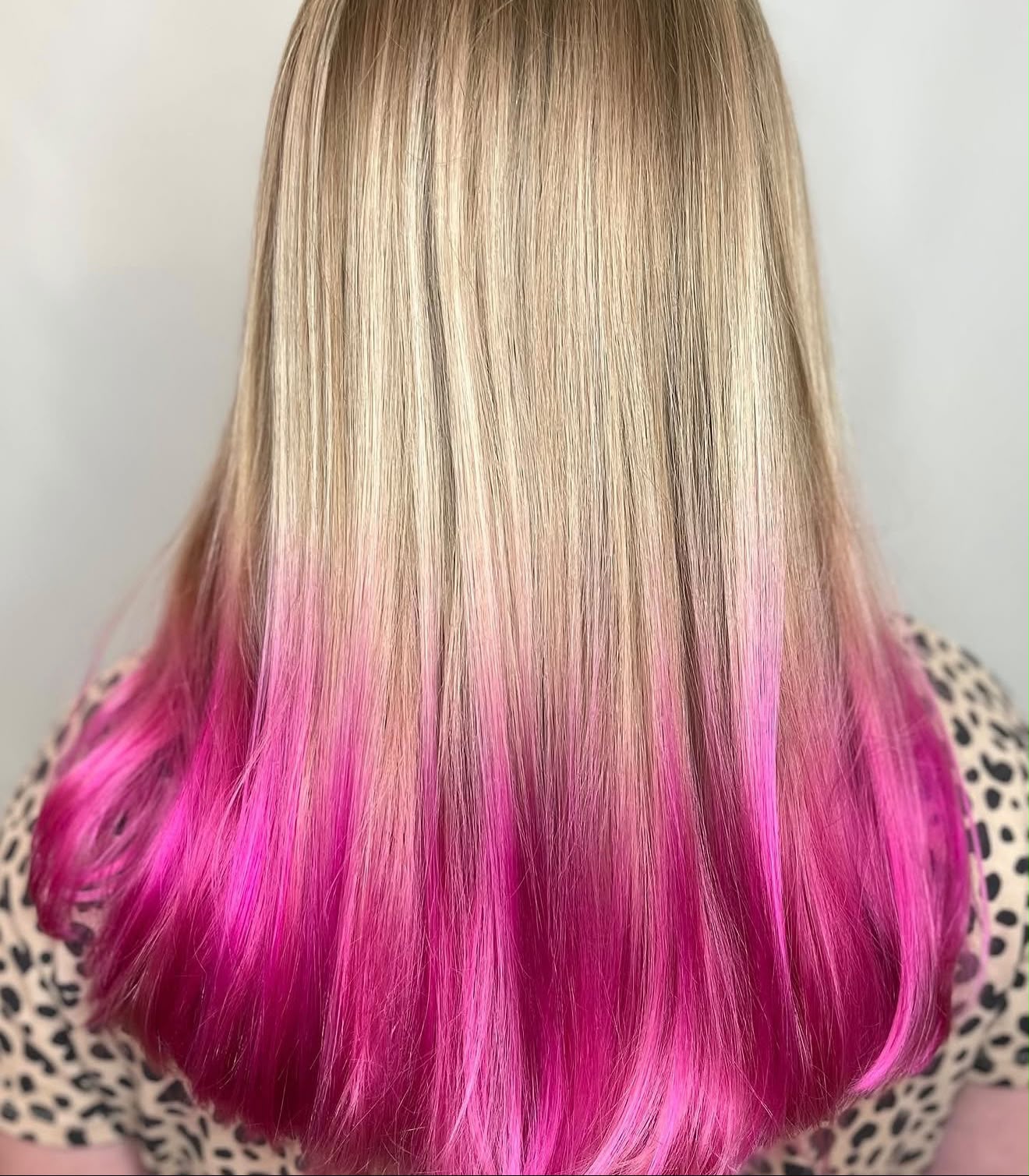 Blonde lengths with vivid magenta underlayer
